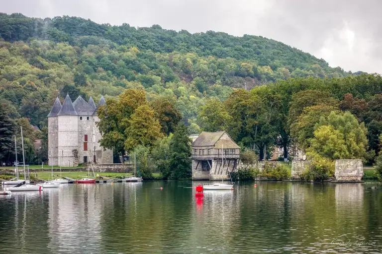 View of the The Old mill & Château des Tourelles from the other side of the Pont Clemenceau bridge