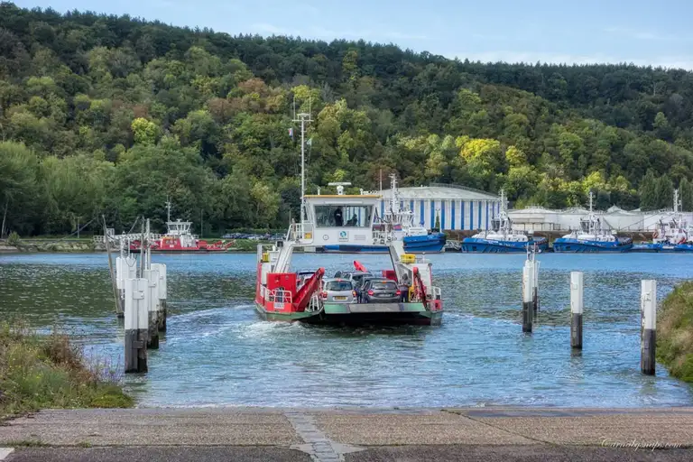 As I depart the ferry at Petit-Couronne I watch it sail back to Val-de-la-Haye