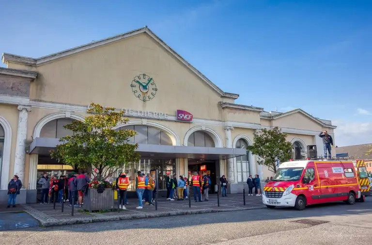  Railway strikers begining to form outside Dieppe's main railway station