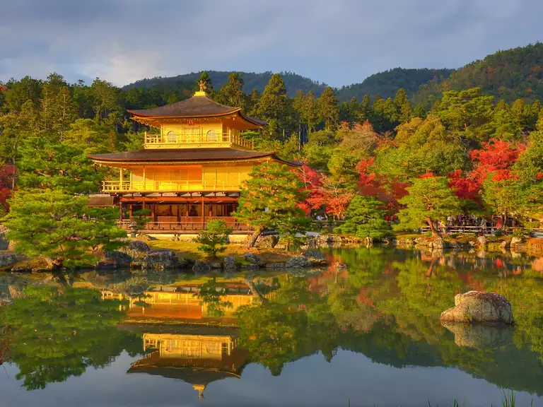 Golden Pavilion pond reflection with autumn colors at Kinkaku ji Kyoto