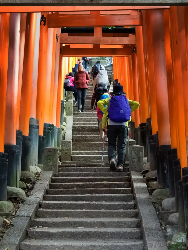 Young and old taking the hike up to sacred Mount Inari at Fushimi Inari Taisha Kyoto
