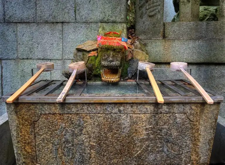 Temizuya on the way up the sacred Mount Inari at Fushimi Inari Taisha Kyoto