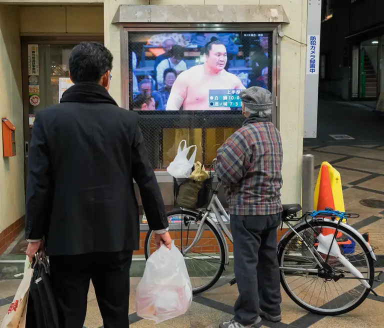 Japanese man watching the Sumo wrestling in Higashimuki Minamimachi Nara