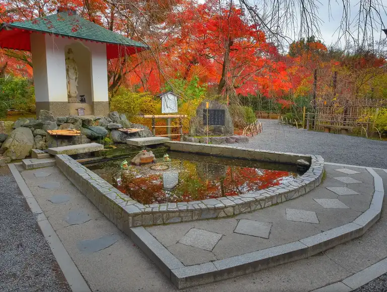 Shrine amongst autumn colors at Tenryu ji Temple Arashiyama