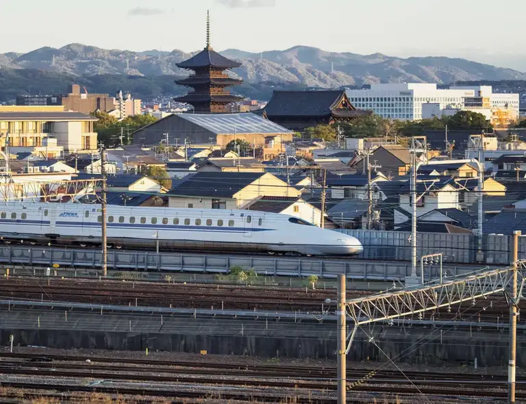  The Shinkansen N700 with To ji in the background as seen from the viewing platform at the Kyoto Railway Museum Kyoto