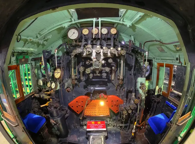 Inside the cabin of a steam train at the Kyoto Railway Museum Kyoto