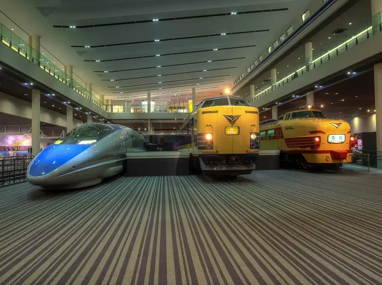 Left to right the 500 521 1 Shinkansen and the KUHANE581 35 and the KUHA489 1 in the main hall at the Kyoto Railway Museum Kyoto
