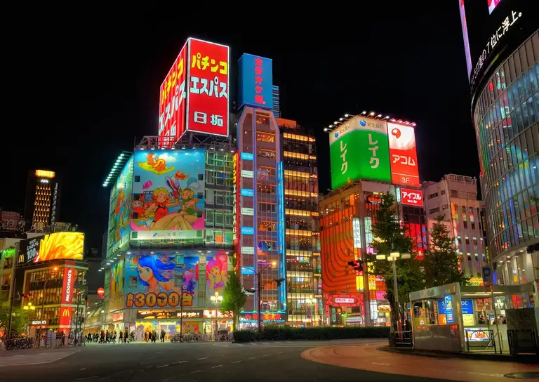 Colorful street intersection lit up at night Shinjuku