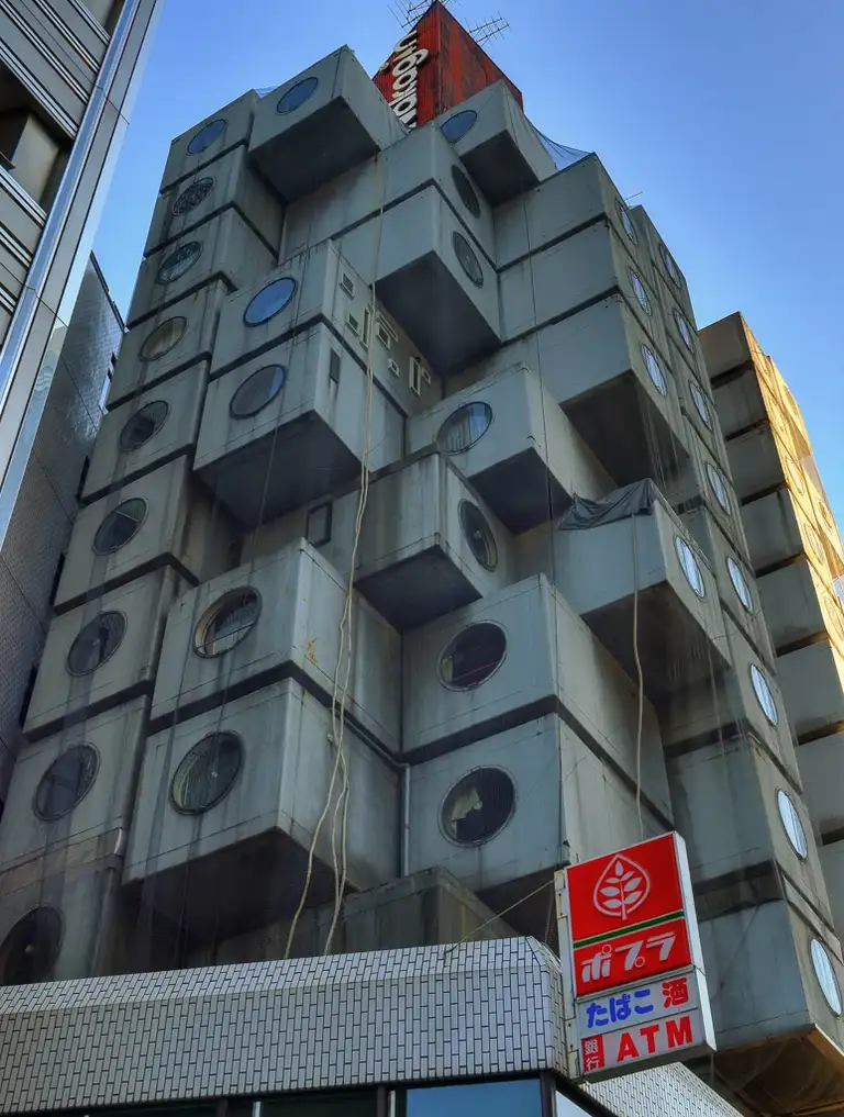 Originally there was 140 capsules in the Nakagin Capsule Tower now only around 30 are used as apartments Shimbashi
