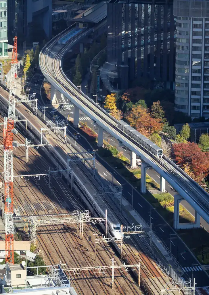 Close up of the Shinkansen and the New Transit Yurikamome from the windows of the Seaside Top Observatory at the World Trade Center Minato