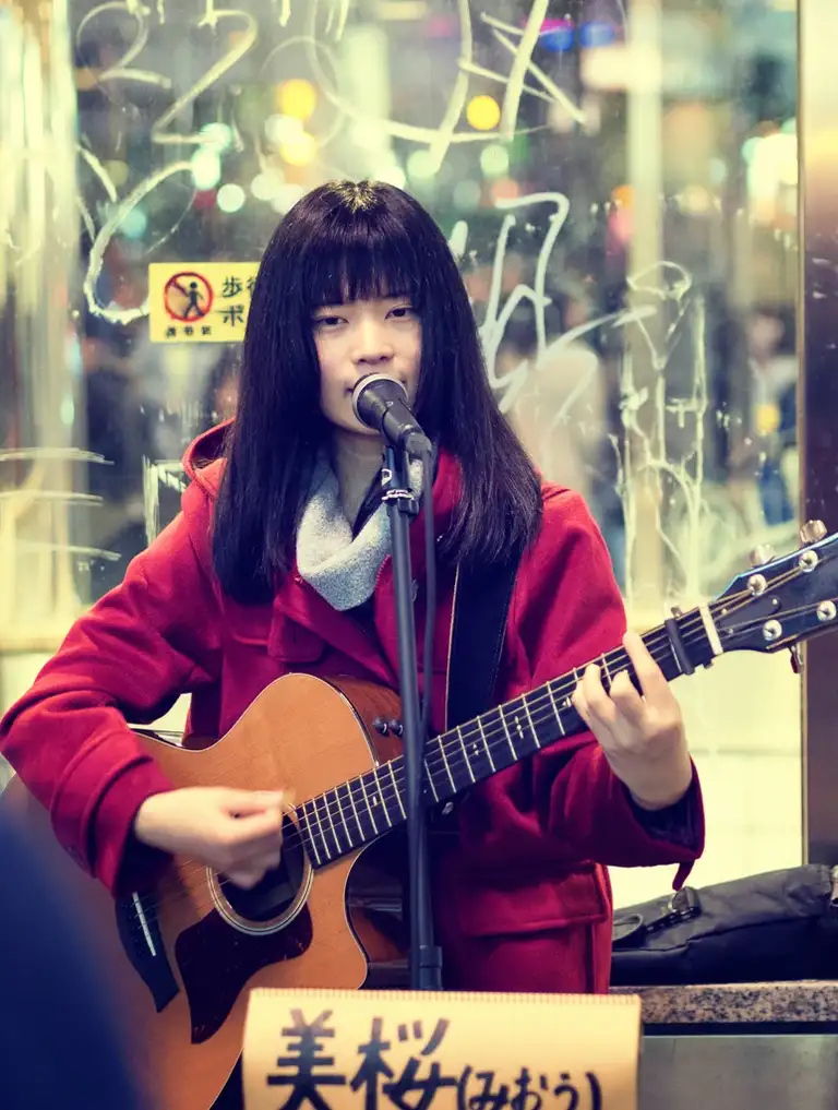  Japanese girl street performer at Shibuya crossing Shibuya