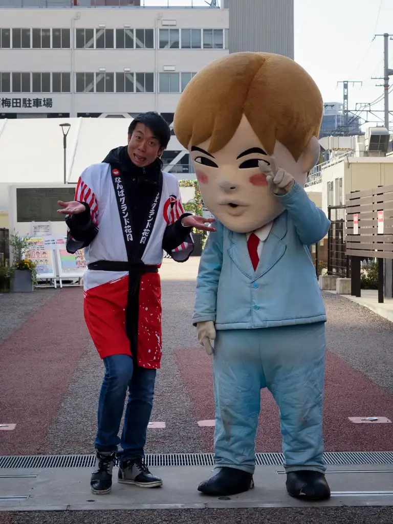 Japanese salaryman mascot posing for the camera Osaka