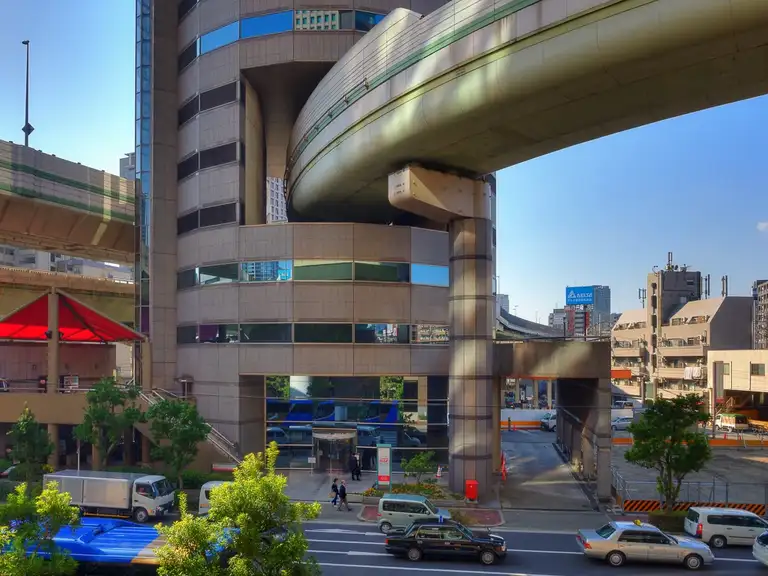 The Gate Tower Building in Umeda that has a highway exit run through it Osaka