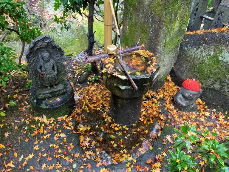 Temizuya or place to purify your hands with water Daisho in Temple Miyajima Island