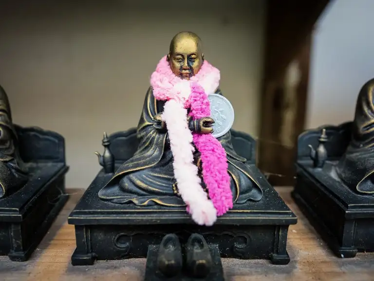 Bronze Buddhist Monk figure Daisho in Temple Miyajima Island