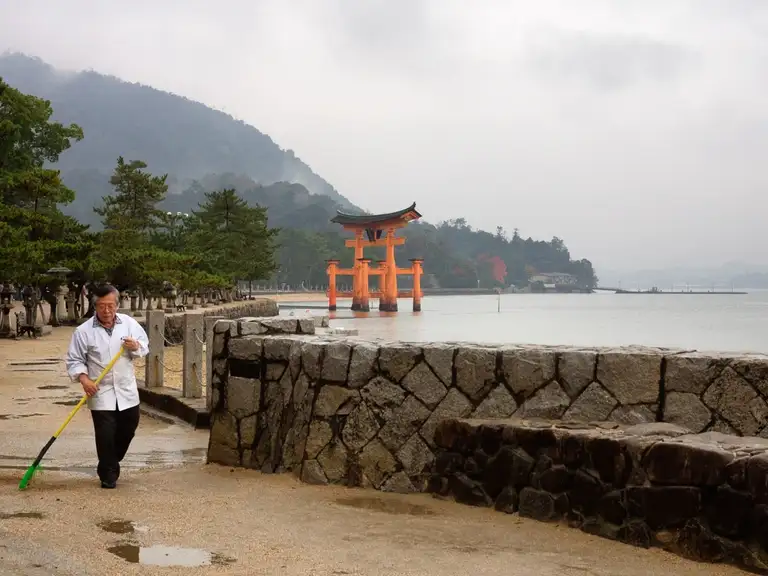  The locals maintain the island immaculately even on rainy days they can be found cleaning up any unwanted deer extras Miyajima Island
