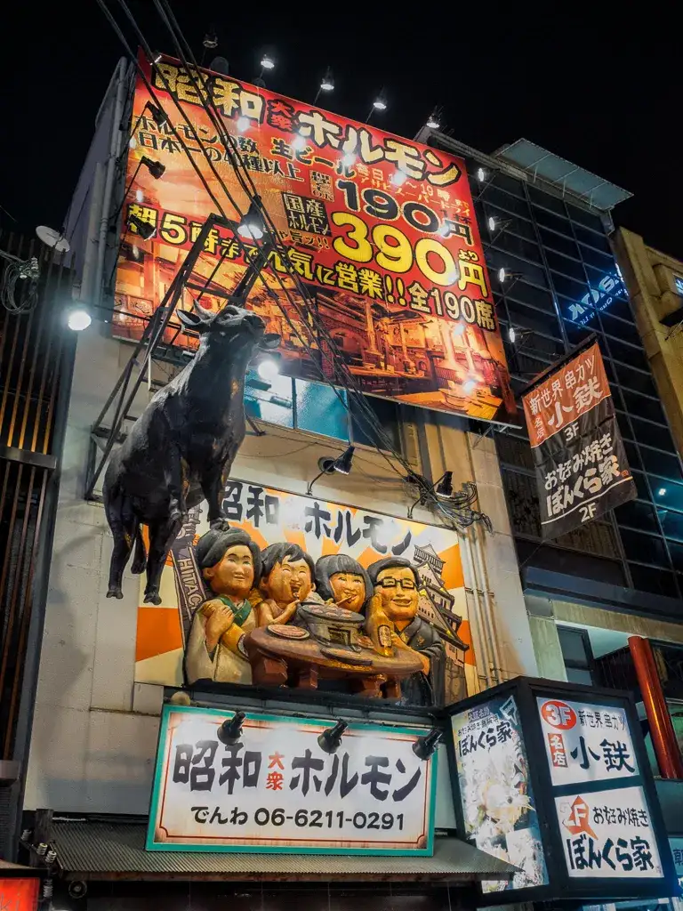 The fun 3 D signage of the Yaki niku restaurant in Dotombori Osaka Night time